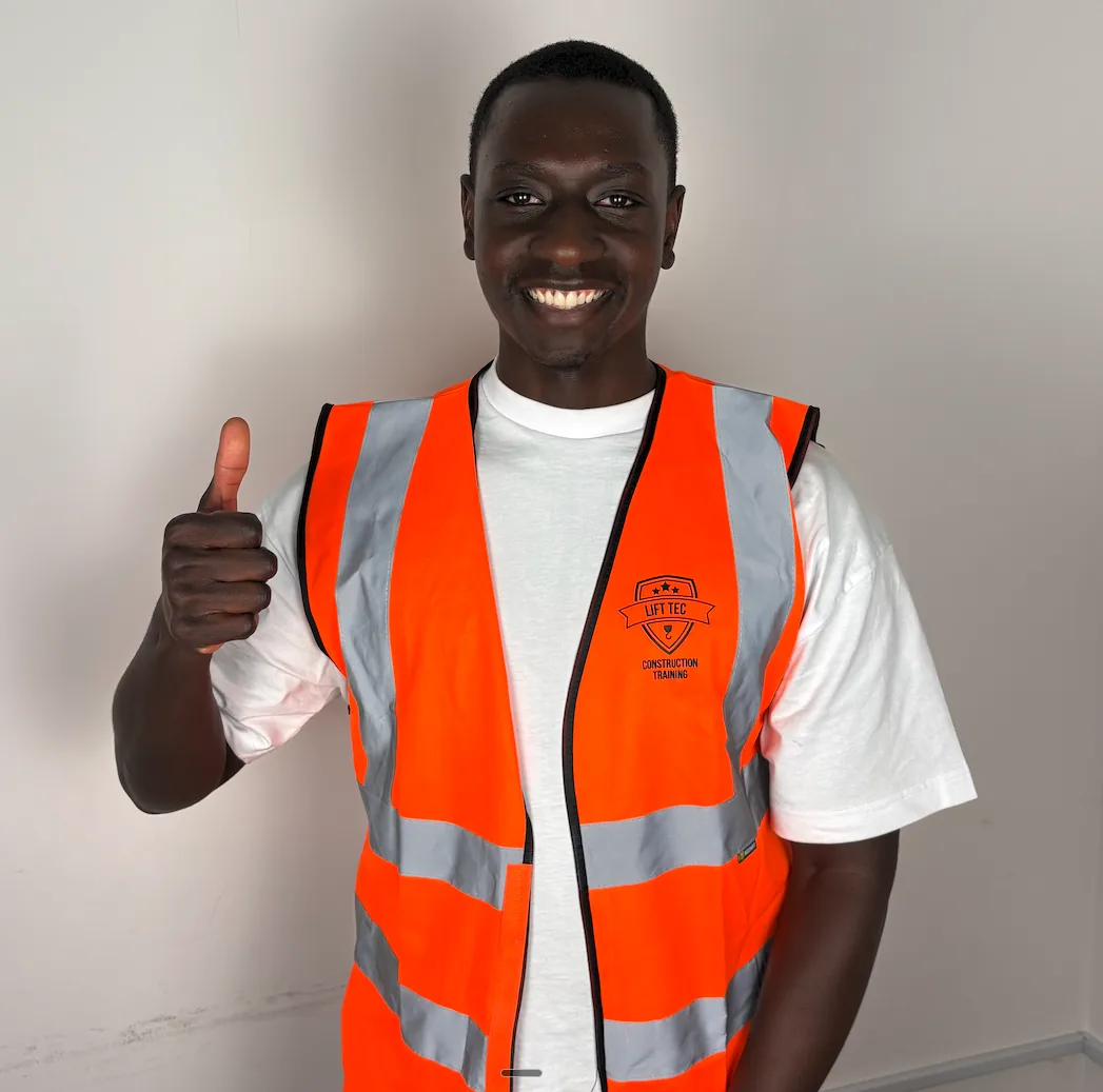 Student in a Lift Tec hi vis vest giving a thumbs up
